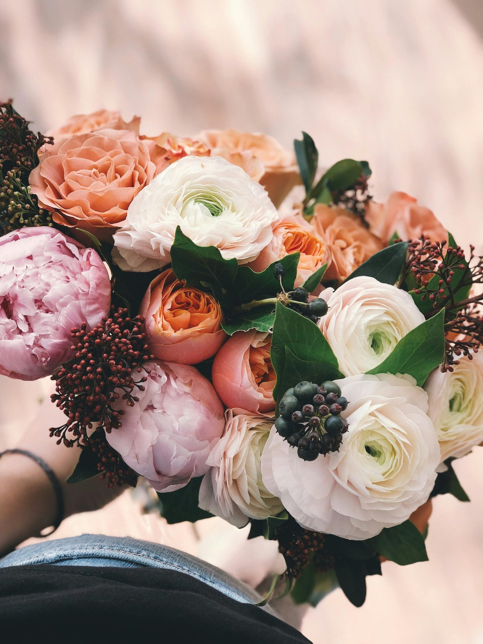 pexels-photo-931155-931155 A colorful bridal bouquet featuring roses and peonies, perfect for weddings.
